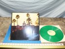 VINTAGE 1976 THE EAGLES HOTEL CALIFORNIA IMPORT GREEN VINYL RECORD V4