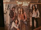 Thin Lizzy - Fighting. Signed by all 4. Excellent condition. Sleeve only.