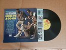 Smokey Robinson And The Miracles Going To A Go Go original vinyl LP: EX j: EX
