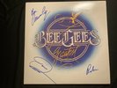Signed Bee Gees 'Greatest' vinyl album, signed in 1988, near mint condition.