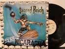 Sacred Reich – Surf Nicaragua LP 1988 Metal Blade – RR 9512 1 VG+/VG Netherlands