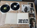 The beatles white album 1968 with all posters.