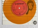 U2 -Another Day- Very Rare CBS Irish Orange Vinyl 7