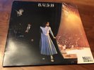 Rush exit stage left vinyl record Neil Peart Geddy Lee Alex Lifeson Promo Stamp