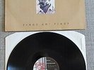 LINTON KWESI JOHNSON - TINGS AN' TIMES - UK ISSUE LP ON STERNS RECORDS-1991-VGC