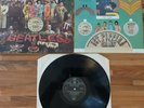 The Beatles SGT. Peppers Lonely Hearts Club Band vinyl LP with cutouts