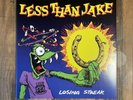 Losing Streak by Less than Jake (Record, 2021)Yellow With Black Splatter