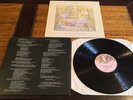 GENESIS SELLING ENGLAND BY THE POUND VERY 1ST PRESS WITH DARK GREEN LYRIC INNER