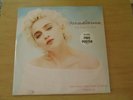 MADONNA , THE LOOK OF LOVE with free poster .