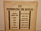 The Beatles an original 1964 introducing vinyl record.