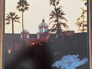 EAGLES - HOTEL CALIFORNIA  - VINYL LP W/POSTER AND INNER SLEEVE- 7E-1084 SP