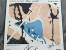 The Stone Roses . She bangs the drums signed.