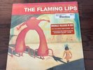 Yoshimi Battles the Pink Robots by The Flaming Lips (Record, 2012)