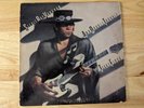STEVIE RAY VAUGHAN.ORIGINAL 1983 VINYL LP.TEXAS FLOOD.VG+.PRIDE & JOY.BLUES