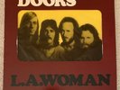 The Doors L.A. Woman 1st pressing.  Vintage banned cover with crucifix insert.