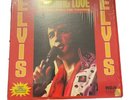 Elvis Presley Burning Love and hits from his movies w/bonus photo.