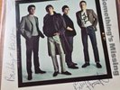 Very rare fully signed by the whole band the chords somethings missing