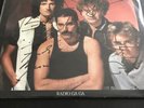Queen “Radio Ga Ha” 7”. Signed By All 4 Members.