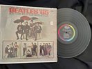 The Beatles “Beatles ‘65” MONO T-2228 Early US press played VG+ partial shrink