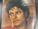 MICHAEL JACKSON THRILLER SINGLE SIGNED ALBUM COVER  (JSA CERT) SUPER RARE 1984