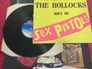 Sex Pistols Never Mind The Bollocks 1978 + Poster  and Badge .