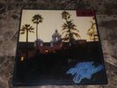 The Eagles Hotel California Sterling Promo Red Sticker VG+ Vinyl LP + NM Poster