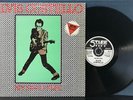 ELVIS COSTELLO MY AIM IS TRUE 1977 STIFF UK PRESSING LP GREEN BACKGROUND COVER