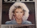 Olivia Newton-John– Livin In Desperate Times / Twist Of Fate 12