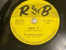 78 ROCKING BROTHERS rock it / behind the sun 1954 RB-1309  plays a strong VG+