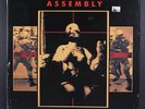 FRONT LINE ASSEMBLY: caustic grip WAX TRAX  12
