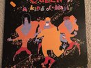 QUEEN: A Kind Of Magic-  CAPITOL 12