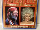 A  Boxed set of 8 LP's The Very Best Of Willie Nelson & Dolly Parton