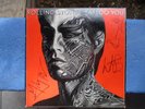 SIGNED ROLLING STONES ALBUM (TATTOO YOU, 1981) BY FOUR ORIGINAL MEMBERS
