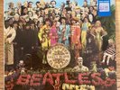The Beatles Sgt Peppers Stereo LP PCS 7027 complete with cut out inclusions