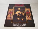 Front Line Assembly – Caustic Grip   (Cover : VG+ / Vinyl : VG+.)