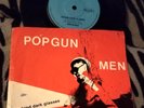 POPGUN MEN BEHIND DARK GLASSES 7