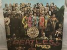 the Beatles Sgt Pepper's Lonely Hearts Club Band Vinyl (with Rare card insert)