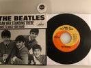 The Beatles / I Want To Hold Your Hand / Capitol 1994 45 & PS  / Mint