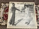 New. Cross Fire Page One  , Sir Collins Label WITH SIGNATURE ON SLEEVE.