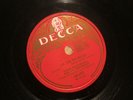 Listen:  78 RPM Louis Armstrong - La Vie En Rose /C'est si bon - Decca Belgium