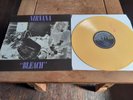 Nirvana – Bleach	Waterfront – DAMP 114, Sub Pop  Yellow With Orange Swirls 2013