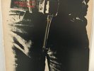 THE  ROLLING  STONES           LP     STICKY FINGERS  (  METAL ZIPPER )