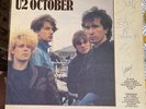 'October' Vinyl Signed and Dated by all of U2 on 14th October 1981 at Top Rank