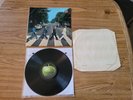 The Beatles ‘Abbey Road’ 1969 U.K. 1st press LP w/ misaligned Apple in vg+ cond