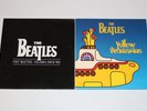 Two Beatles Albums Yellow Submarine And Past Masters Volumes 1 & 2