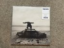 The 1975 - Being Funny in a Foreign Language.  Spotify Black/White Galaxy Vinyl