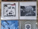 Vintage U2 '4 U2 Play' 4 vinyl singles in plastic wall hanger. Sunburst Label.