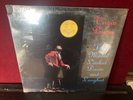 VIRGIN PRUNES- THE MOON LOOKED DOWN AND LAUGHED-ON TOUCH AND GO RECORDS- SEALED