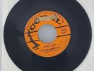 The Johnny Burnette Trio – Honey Hush / The Train Kept A-Rollin'  Coral