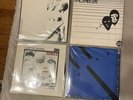 Vintage U2  ‘U2 Play’ 4 vinyl singles in plastic wall hanger. NOS Import Rare